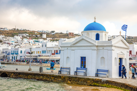 Mykonos, Greece - 17.10.2018: Agios Nikolaos Church by the sea in Port of Mykonos Town in Greeceのeditorial素材