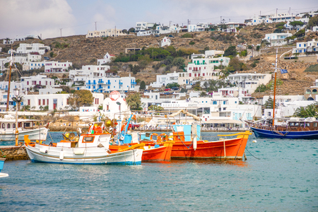 Mykonos, Greece - 17.10.2018: Port of Mykonos Town with white arhitecture and colorfull boats in Greeceのeditorial素材
