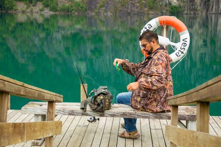 Stryn, Norway - 26.06.2018: Fisherman on Oppstrynsvatn is a lake in the municipality of Stryn in Sogn og Fjordane county in Norwayのeditorial素材