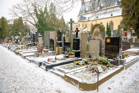 Prague, Czech republic - 26.01.2019: Old graves and crypts on Vysehrad Cemetery in winter time,...