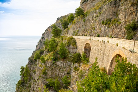 Mountain road with sea view near Maratea, Basilicata in Italyの写真素材