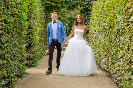 Charming newlywed couple in Wallenstein garden in Prague in Czech Republicの写真素材