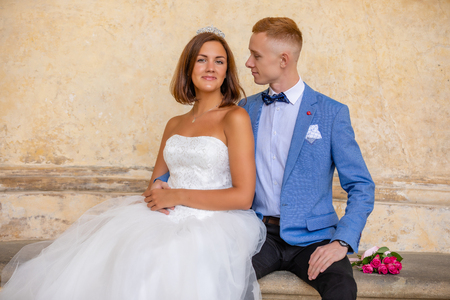 Charming newlywed couple in Wallenstein garden in Prague in Czech Republicの写真素材