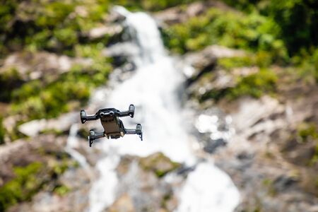 Hainan, China - 21.06.2019: DJI MAVIC AIR - Compact Drone by DJI with 12 MP 4K HDR camera, mounted...