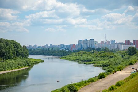 Kemerovo, Siberia, Russia - 14.07.2019: Aerial view of Tom river, embankment and cityscape Kemerovo city in Siberia, Russiaのeditorial素材