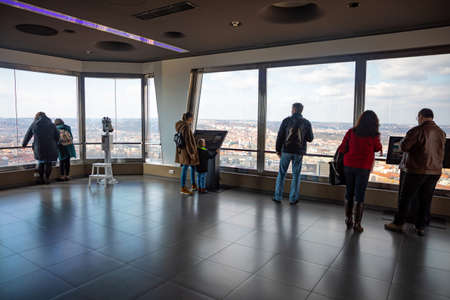 Prague. Czech Republic - 12.03.2020: People walking inside Zizkov television tower, Prague, Czech...