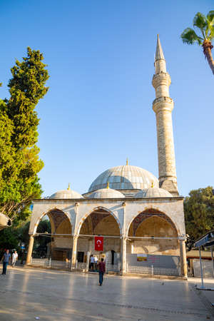Antalya, Turkey - 7.09.2020: Murat Pasha Camii Mosque and minaret under blue sky in Antalya city,...
