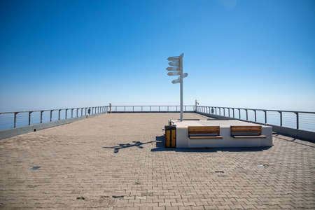 Observation deck and Sign indicating directions at the top of Tahtali mountain near Kemer in Turkey