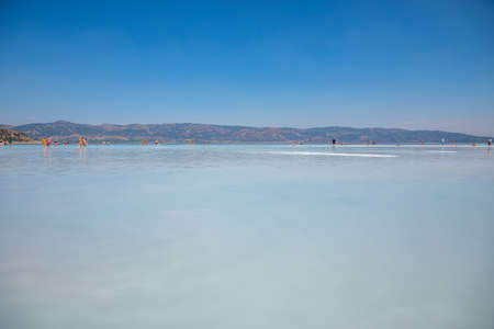 Salda Lake, Burdur, Turkey - 12.09.2020: People on the white beach of Salda Lake in Burdur, Turkeyのeditorial素材