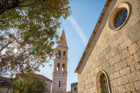 Marble stone architecture at city center with Saint Stephan Church in Stari Grad, Croatia