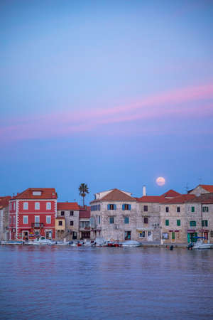 Stari Grad, Croatia - 28.03.2021: Embankment of Stari Grad town on the Hvar island without people, Croatia. Night timeのeditorial素材