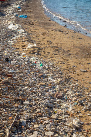 Beach polluted with plastic garbage due to sea currents, Vis island, Croatia.の写真素材