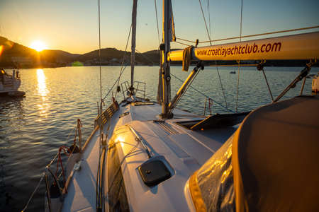 Vis, Croatia - 31.03.2021: luxury yacht in the marina at sunset lights in Croatiaのeditorial素材