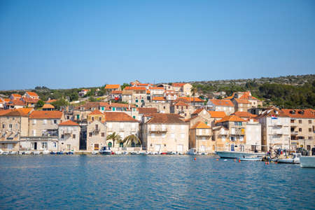 Milna, Croatia - 1.04.2021: Wiew from water of the city of Milna, Croatia