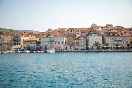 Milna, Croatia - 1.04.2021: Wiew from water of the city of Milna, Croatiaのeditorial素材