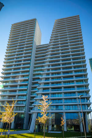 Prague, Czech republic - 18.04.2021: Common modern apartment skyscrapers, high rise buildings. Skyscrapers from a low angle view in modern city Prague, V-Towerのeditorial素材