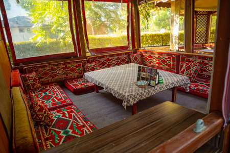 Antalya, Turkey - 15.09.2020: Garden restaurant with picnic and recreation area, traditional turkish breakfast place in Hacisekililer near Antalya, Turkeyのeditorial素材