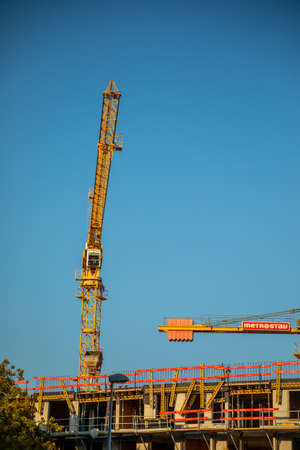 Prague, Czech Republic - 04.09.2021: New modern residential building contruction work with crane around Vackov in Zizkov district in Prague 3, Czech republic.のeditorial素材
