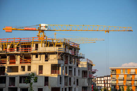 Prague, Czech Republic - 04.09.2021: New modern residential building contruction work with crane around Vackov in Zizkov district in Prague 3, Czech republic.のeditorial素材