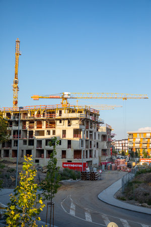 Prague, Czech Republic - 04.09.2021: New modern residential building contruction work with crane around Vackov in Zizkov district in Prague 3, Czech republic.のeditorial素材