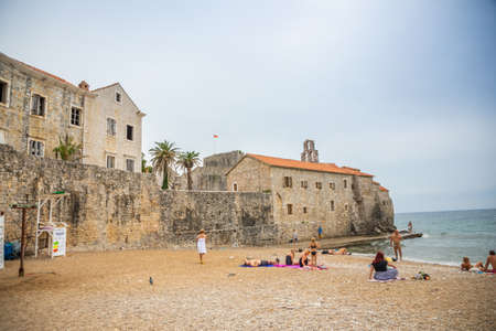 Budva, Montenegro - September 18, 2021: Landscape of old town Budva. Ancient walls and tiled roof of old town Budva, Montenegroのeditorial素材