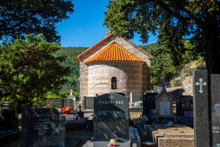 Podostrog, Budva - September 23, 2021: Church of St. John the Theologian and cemetery near, Podostrog, Budva, Montenegroのeditorial素材