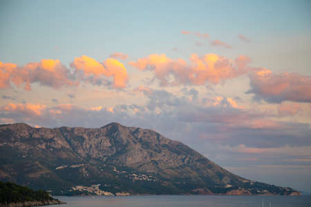 Pink mountain at sunrise ligths in Budva, Montenegroの写真素材