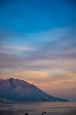 Pink mountain at sunrise ligths in Budva, Montenegroの写真素材