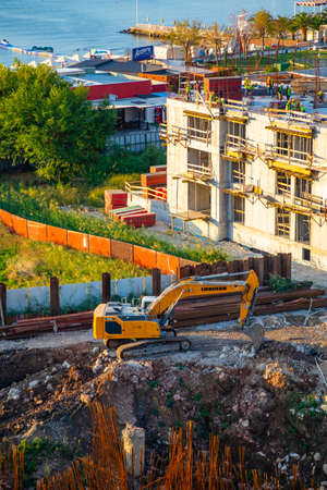 Budva, Montenegro - October 2, 2021: Budva building construction. Construction crane high-rise building in the center of Budva, Montenegroのeditorial素材