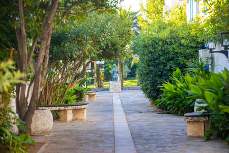 Budva, Montenegro - September 26, 2021: Empty streets of hotel complex Slovenska Plaza with white architecture of villas at autumn sunny dayのeditorial素材