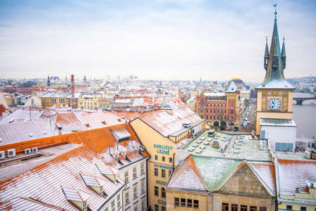 Prague, Czech Republic - December 26, 2021: Panorama of Prague roofs covered with snow in winter, Czech Republicのeditorial素材