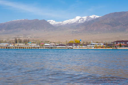 Issyk-Kul Lake is second biggest mountain lake in the world in Kyrgyzstan in an spring sunny day.の写真素材