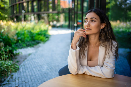 Close up portrait of a professional business woman siting outdoorの写真素材