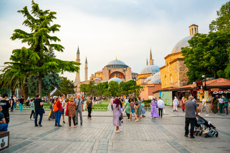 Istanbul, Turkey - May 29, 2022: St. Sophia Cathedral and near park territory with walking people in old town of Istanbul at evening time, Turkeyのeditorial素材