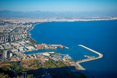 Aerial view of beautiful blue gulf and Konyaalti beach in popular resort city Antalya, Turkey.の写真素材