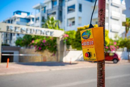 Antalya, Turkey - September 26, 2022: Taxi call button in outside street of Antalya, Turkeyのeditorial素材