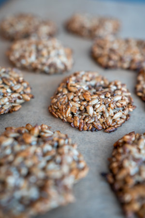 Vegan cookies made of banana and different seeds, photographed with natural light. High quality photoの写真素材