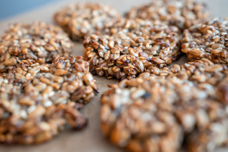 Vegan cookies made of banana and different seeds, photographed with natural light. High quality...