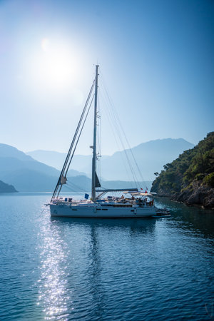 Fethiye, Turkey - June 6, 2023: A coastal scene at Gemiler Island or St. Nicholas Island with mooring yachts near Fethiye, Turkey. High quality photoのeditorial素材