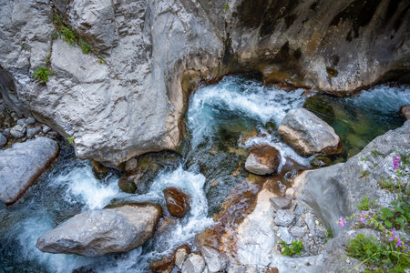 Fast flowing water in Sapadere canyon with rocks and stones in the Taurus mountains near Alanya, Turkey. High quality photoの写真素材