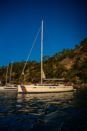 Oludeniz, Turkey - June 9, 2023: Mooring yachts near Oludeniz beach in the morning, Turkey. High quality photoのeditorial素材