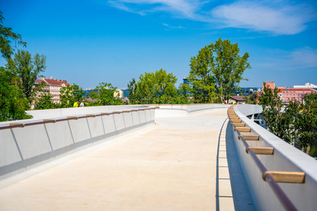 Prague, Czech Republic - August 19, 2023: Holka footbridge in Prague. New and modern bridge over Vltava river from Karlin to Holesovice district , Prague, Czech Republic. High quality photoのeditorial素材
