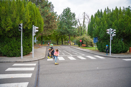 Prague, Czech republic - October 10, 2023: Children ride public bikes on one of traffic playground, Prague, Czech republic. High quality photoのeditorial素材