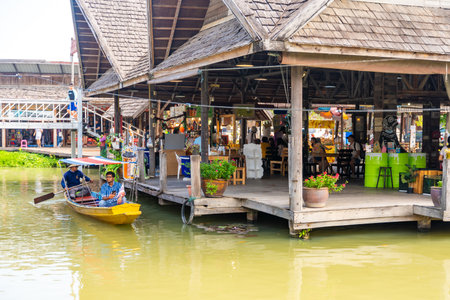 Pattaya, Thailand - December 29, 2023: Floating open air market with small houses - shops on the pond in Pattaya, Thailand. High quality photoのeditorial素材