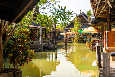 Pattaya, Thailand - December 29, 2023: Floating open air market with small houses - shops on the pond in Pattaya, Thailand. High quality photoのeditorial素材