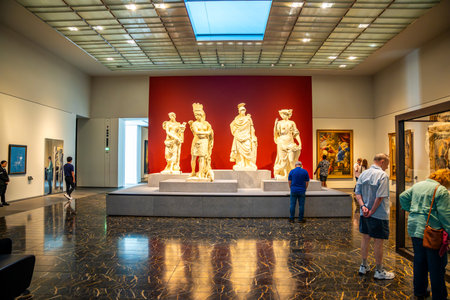 Abu Dhabi, UAE - December 6, 2023: Interior of Louvre and Visitors looking at exhibits, museum in Abu Dhabi, UAE. High quality photoのeditorial素材