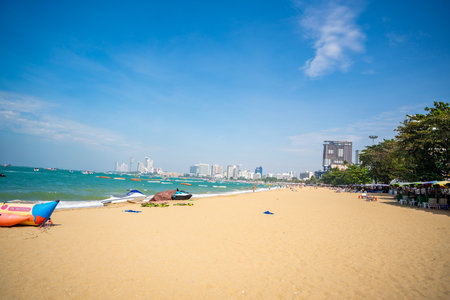 Pattaya, Thailand - December 26, 2023. Boats on turquoise water. North Pattaya beach in Thailand seaside. Pattaya, Thailand. . High quality photoのeditorial素材