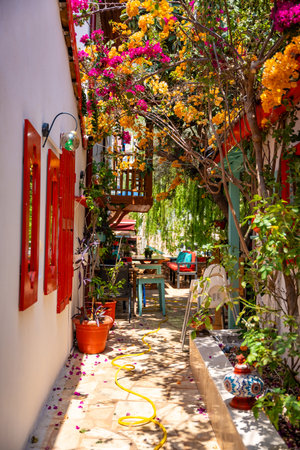 Kas, Turkey - May 12, 2024: Small old street in Kas town in Turkey . High quality photoのeditorial素材