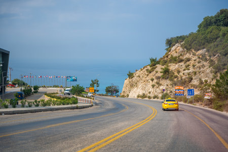 Fethie, Turkey - May 12, 2024: Turkish taxi on the road to Oludeniz beach near Fethie. High quality photoのeditorial素材