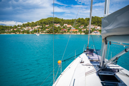 Yacht sailing near Croatia coast. Close-up view of the deck, mast and sails. Yachting concept. High quality photoの写真素材